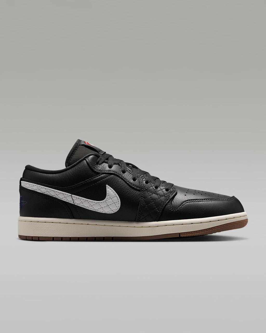 Air Jordan 1 Low Black White Quilted Swoosh Gum Outsole Leather Sneakers