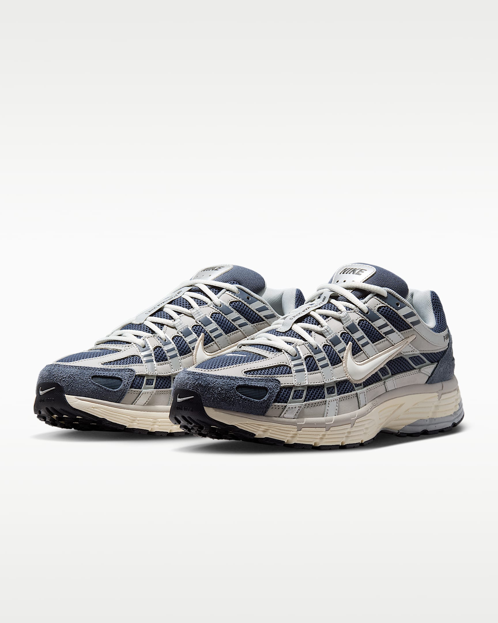 Nike P-6000 – Navy / Beige / Grey Mesh Athletic Sneakers