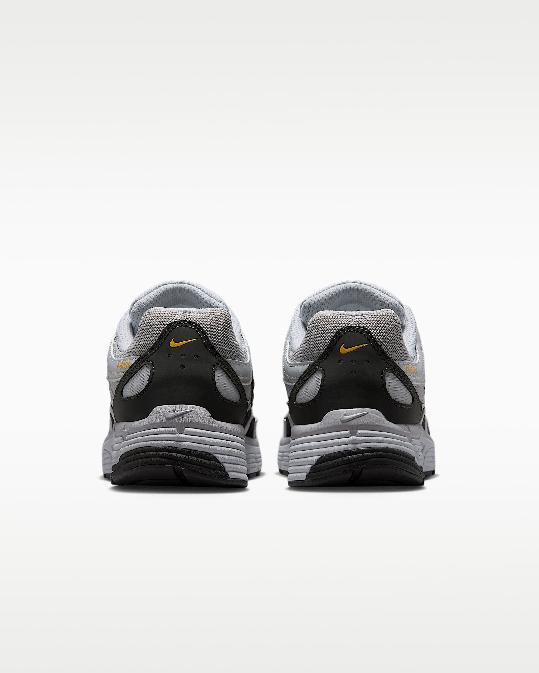 Nike P-6000 – Grey / Black / Orange Mesh Athletic Sneakers