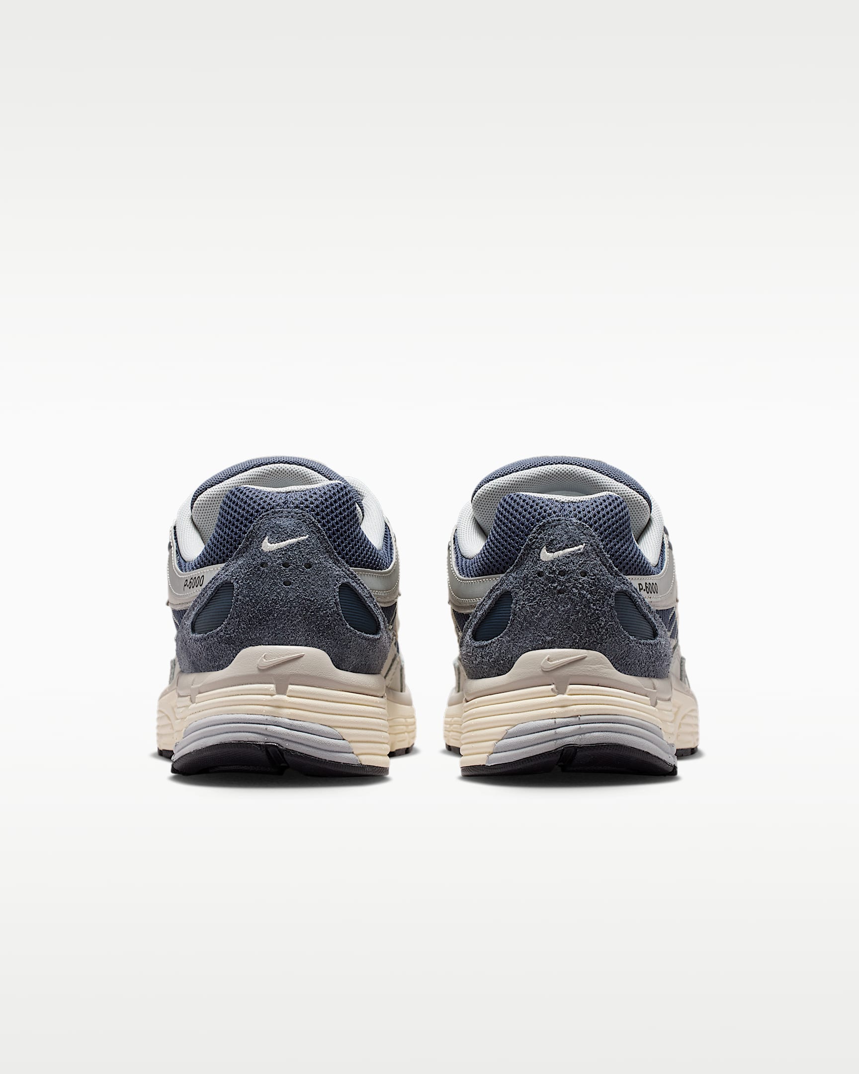 Nike P-6000 – Navy / Beige / Grey Mesh Athletic Sneakers